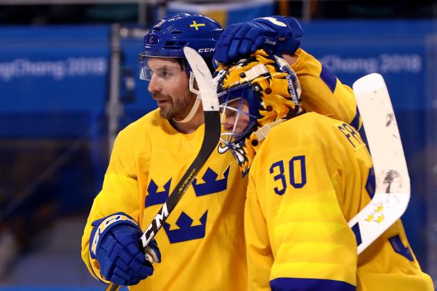 GANGNEUNG, SOUTH KOREA - FEBRUARY 18:  Johan Fransson #8 and Viktor Fasth #30 of Sweden celebrate after defeating Finland 3-1 during the Men's Ice Hockey Preliminary Round Group C game on day nine of the PyeongChang 2018 Winter Olympic Games at Kwandong Hockey Centre on February 18, 2018 in Gangneung, South Korea.  (Photo by Ronald Martinez/Getty Images)