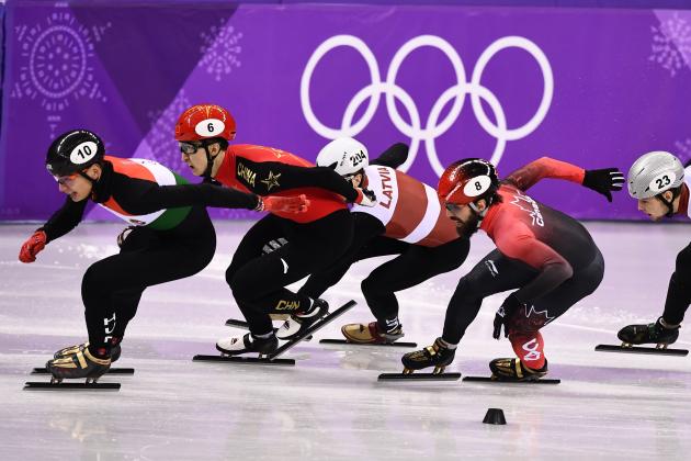 (L-R) Hungary's Sandor Liu Shaolin, China's Wu Dajing, Latvia's Roberto Pukitis, Canada's Charles Hamelin and Latvia's Roberts Janis Zvejnieks compete in the men's 1,000m short track speed skating quarter-final event during the Pyeongchang 2018 Winter Olympic Games, at the Gangneung Ice Arena in Gangneung on February 17, 2018. / AFP PHOTO / ARIS MESSINIS        (Photo credit should read ARIS MESSINIS/AFP/Getty Images)