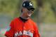 Miami Marlins manager Don Mattingly smiles during spring training baseball practice Sunday, Feb. 18, 2018, in Jupiter, Fla. (AP Photo/Jeff Roberson)