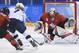 Canada goaltender Genevieve Lacasse (31) makes a save on United States forward Monique Lamoureux-Morando (7) during second period preliminary round women's hockey action at the 2018 Olympic Winter Games in Pyeongchang, South Korea, on Thursday, February 15, 2018. (Nathan Denette/The Canadian Press via AP)