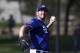 Los Angeles Dodgers starting pitcher Clayton Kershaw throws at the team's spring training baseball facility Monday, Feb. 19, 2018, in Glendale, Ariz. (AP Photo/Carlos Osorio)