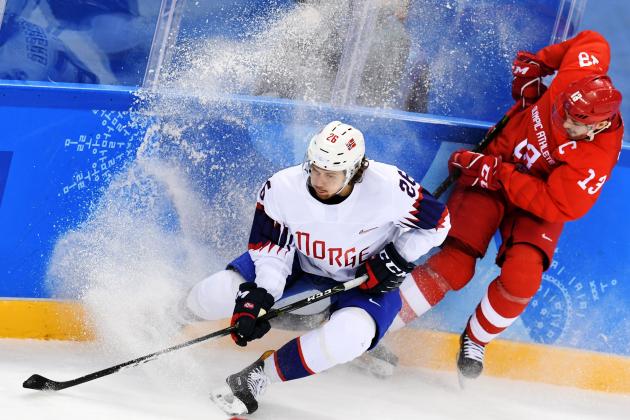 Russia's Pavel Datsyk (R) fights for the puck with Norway's Kristian Forsberg in the men's quarter-final ice hockey match between Norway and the Olympic Athletes from Russia (OAR) during the Pyeongchang 2018 Winter Olympic Games at the Gangneung Hockey Centre in Gangneung on February 21, 2018.   / AFP PHOTO / Kirill KUDRYAVTSEV        (Photo credit should read KIRILL KUDRYAVTSEV/AFP/Getty Images)