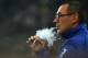 Empoli's coach Maurizio Sarri smokes a cigarette before the Italian Serie A football match Juventus Vs Empoli on April 4, 2015 at the 'Juventus Stadium' in Turin. AFP PHOTO / MARCO BERTORELLO (Photo credit should read MARCO BERTORELLO/AFP/Getty Images)