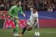 Manchester United's Spanish goalkeeper David De Gea (L) vies with Sevilla's Colombian forward Luis Muriel during the UEFA Champions League round of 16 first leg football match Sevilla FC against Manchester United at the Ramon Sanchez Pizjuan stadium in Sevilla on February 21, 2018. / AFP PHOTO / JORGE GUERRERO (Photo credit should read JORGE GUERRERO/AFP/Getty Images)