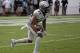 Central Florida's Mike Hughes returns a kickoff against Connecticut during the first half of an NCAA college football game, Saturday, Nov. 11, 2017, in Orlando, Fla. (AP Photo/John Raoux)