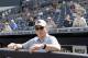 New York Yankees General Manager Brian Cashman looks out from the dugout at baseball spring training camp, Wednesday, Feb. 21, 2018, in Tampa, Fla. (AP Photo/Lynne Sladky)