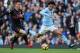 MANCHESTER, ENGLAND - NOVEMBER 05: Leroy Sane of Manchester City competes with Laurent Koscielny of Arsenal during the Premier League match between Manchester City and Arsenal at Etihad Stadium on November 5, 2017 in Manchester, England. (Photo by Matthew Ashton - AMA/Getty Images)
