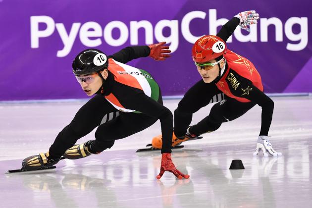 (L-R) Hungary's Sandor Liu Shaolin and China's Ren Ziwei compete in the men's 500m short track speed skating B final event during the Pyeongchang 2018 Winter Olympic Games, at the Gangneung Ice Arena in Gangneung on February 22, 2018. / AFP PHOTO / ARIS MESSINIS (Photo credit should read ARIS MESSINIS/AFP/Getty Images)