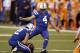 Indianapolis Colts kicker Adam Vinatieri (4) kicks a field goal from the hold of Rigoberto Sanchez during the first half of an NFL football game against the Denver Broncos in Indianapolis, Thursday, Dec. 14, 2017. (AP Photo/Darron Cummings)