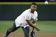 Seattle Seahawks quarterback Russell Wilson throws out the ceremonial first pitch before a baseball game between the Seattle Mariners and Los Angeles Angels Friday, Sept. 2, 2016, in Seattle. (AP Photo/Elaine Thompson)
