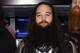 NEW YORK, NY - MARCH 29: WWE Superstars Braun Strowman, Bray Wyatt and Erick Rowan ring The New York Stock Exchange Opening Bell in honor of WrestleMania 32 at New York Stock Exchange on March 29, 2016 in New York City. (Photo by Jamie McCarthy/Getty Images)