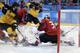 Matthias Plachta (22), of Germany, shoot the puck past goalie Kevin Poulin (31), of Canada, for a goal during the second period of the semifinal round of the men's hockey game at the 2018 Winter Olympics in Gangneung, South Korea, Friday, Feb. 23, 2018. (AP Photo/Julio Cortez)