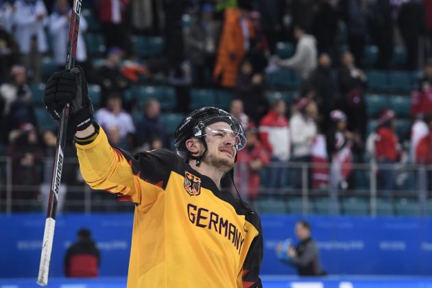 Germany's Patrick Reimer celebrates winning the men's semi-final ice hockey match between Canada and Germany during the Pyeongchang 2018 Winter Olympic Games at the Gangneung Hockey Centre in Gangneung on February 23, 2018.   / AFP PHOTO / JUNG Yeon-Je        (Photo credit should read JUNG YEON-JE/AFP/Getty Images)