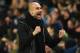 Manchester City's Spanish manager Pep Guardiola celebrates their first goal during the English Premier League football match between Manchester City and Newcastle United at the Etihad Stadium in Manchester, north west England, on January 20, 2018. / AFP PHOTO / Oli SCARFF / RESTRICTED TO EDITORIAL USE. No use with unauthorized audio, video, data, fixture lists, club/league logos or 'live' services. Online in-match use limited to 75 images, no video emulation. No use in betting, games or single club/league/player publications. / (Photo credit should read OLI SCARFF/AFP/Getty Images)