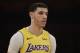 Los Angeles Lakers' Lonzo Ball walks on the court during the first half of an NBA basketball game against the San Antonio Spurs Thursday, Jan. 11, 2018, in Los Angeles. (AP Photo/Jae C. Hong)