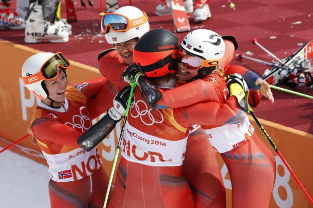 Team Norway celebrates winning the bronze medal in the alpine team event at the 2018 Winter Olympics in Pyeongchang, South Korea, Saturday, Feb. 24, 2018. (AP Photo/Christophe Ena)
