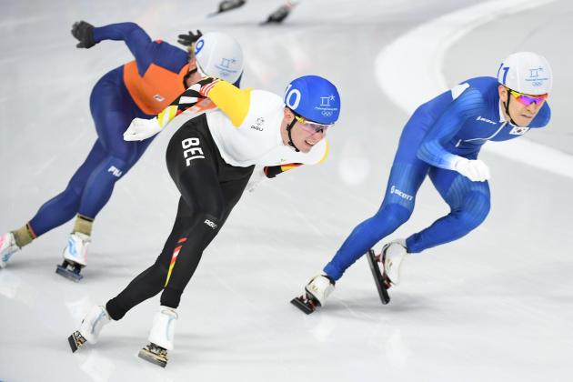 R-L: South Korea's Lee Seung-Hoon, Belgium's Bart Swings and Netherlands' Koen Verweij compete in the men's mass start final speed skating event during the Pyeongchang 2018 Winter Olympic Games at the Gangneung Oval in Gangneung on February 24, 2018. / AFP PHOTO / Roberto SCHMIDT (Photo credit should read ROBERTO SCHMIDT/AFP/Getty Images)