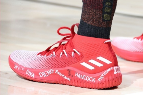 Donovan Mitchell supports cards with Louisville shoes