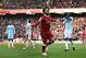 Liverpool's Egyptian midfielder Mohamed Salah celebrates scoring the team's second goal during the English Premier League football match between Liverpool and West Ham United at Anfield in Liverpool, north west England on February 24, 2018. / AFP PHOTO / Oli SCARFF / RESTRICTED TO EDITORIAL USE. No use with unauthorized audio, video, data, fixture lists, club/league logos or 'live' services. Online in-match use limited to 75 images, no video emulation. No use in betting, games or single club/league/player publications. / (Photo credit should read OLI SCARFF/AFP/Getty Images)