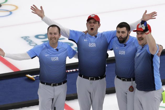 United States team celebrate during the men's curling finals match against Sweden at the 2018 Winter Olympics in Gangneung, South Korea, Saturday, Feb. 24, 2018. United States won gold. (AP Photo/Aaron Favila)