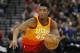 FILE- In this Feb. 9, 2018, file photo, Utah Jazz guard Donovan Mitchell (45) drives up court in the second half during an NBA basketball game against the Charlotte Hornets in Salt Lake City. Mitchell and Philadelphia 76ers' Ben Simmons, the leading rookie of the year candidates, will play together Friday, Feb. 16, when the NBA's best first- and second-year players compete in the Rising Stars in Los Angeles to tip off All-Star weekend. (AP Photo/Rick Bowmer, File)