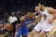 OAKLAND, CA - JANUARY 18: Russell Westbrook #0 of the Oklahoma City Thunder drives on Zaza Pachulia #27 and Klay Thompson #11 of the Golden State Warriors at ORACLE Arena on January 18, 2017 in Oakland, California. NOTE TO USER: User expressly acknowledges and agrees that, by downloading and or using this photograph, User is consenting to the terms and conditions of the Getty Images License Agreement. (Photo by Ezra Shaw/Getty Images)