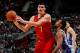 ATLANTA, GA - FEBRUARY 11: Ish Smith #14 of the Detroit Pistons defends against Ersan Ilyasova #7 of the Atlanta Hawks at Philips Arena on February 11, 2018 in Atlanta, Georgia. NOTE TO USER: User expressly acknowledges and agrees that, by downloading and or using this photograph, User is consenting to the terms and conditions of the Getty Images License Agreement. (Photo by Kevin C. Cox/Getty Images)