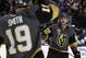 Vegas Golden Knights right wing Reilly Smith (19) congratulates center William Karlsson after Karlsson scored during the first period of the team's NHL hockey game against the Vancouver Canucks on Friday, Feb. 23, 2018, in Las Vegas. (AP Photo/Isaac Brekken)