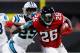 ATLANTA, GA - DECEMBER 31: Tevin Coleman #26 of the Atlanta Falcons is tackled by Mike Adams #29 of the Carolina Panthers on a run during the first half Mercedes-Benz Stadium on December 31, 2017 in Atlanta, Georgia. (Photo by Kevin C. Cox/Getty Images)