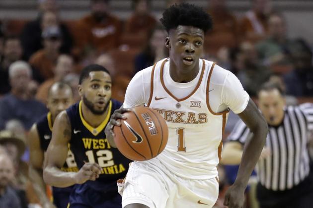 FILE - In this Jan. 14, 2017, file photo, Texas guard Andrew Jones (1) brings the ball up court during the second half of an NCAA college basketball game against West Virginia in Austin, Texas. The announcement that Jones was diagnosed with leukemia prompted concern and well wishes from across college basketball. He is now starting to offer glimpses of how he’s coping with his treatment, and sending “thank you” messages for the emotional and financial support that have poured in to help. (AP Photo/Eric Gay, File)