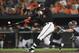 Baltimore Orioles' Jonathan Schoop connects for a single against theTampa Bay Rays in the third inning of a baseball game, Friday, Sept. 22, 2017, in Baltimore. (AP Photo/Gail Burton)