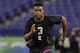 Oklahoma offensive lineman Orlando Brown runs a drill at the NFL football scouting combine in Indianapolis, Friday, March 2, 2018. (AP Photo/Michael Conroy)