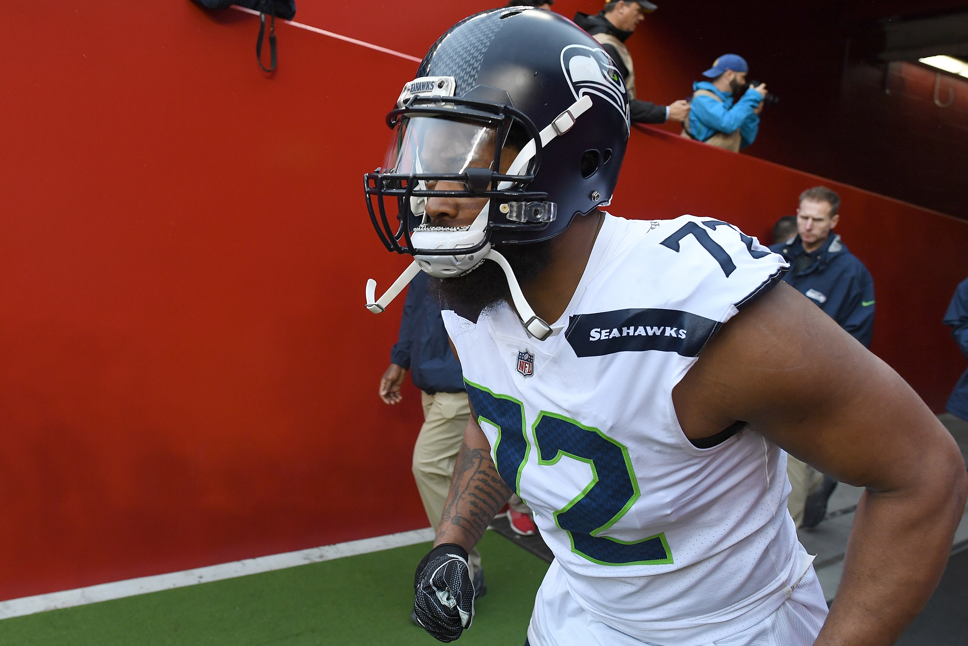 SANTA CLARA, CA - NOVEMBER 26: Michael Bennett #72 of the Seattle Seahawks runs onto the field prior to the start of an NFL football game against the San Francisco 49ers at Levi's Stadium on November 26, 2017 in Santa Clara, California. (Photo by Thearon W. Henderson/Getty Images)
