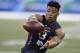 Penn State running back Saquon Barkley runs a drill during the NFL football scouting combine, Friday, March 2, 2018, in Indianapolis. (AP Photo/Darron Cummings)