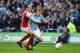 Manchester City's Belgian midfielder Kevin De Bruyne (R) vies with Arsenal's Spanish defender Hector Bellerin during the English League Cup final football match between Manchester City and Arsenal at Wembley stadium in north London on February 25, 2018. / AFP PHOTO / Glyn KIRK / RESTRICTED TO EDITORIAL USE. No use with unauthorized audio, video, data, fixture lists, club/league logos or 'live' services. Online in-match use limited to 75 images, no video emulation. No use in betting, games or single club/league/player publications. / (Photo credit should read GLYN KIRK/AFP/Getty Images)