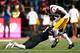 PULLMAN, WA - SEPTEMBER 29: Joseph Lewis IV #1 of the USC Trojans is tackled by Marcellus Pippins #21 of the Washington State Cougars in the second half at Martin Stadium on September 29, 2017 in Pullman, Washington. Washington State defeated USC 30-27. (Photo by William Mancebo/Getty Images)