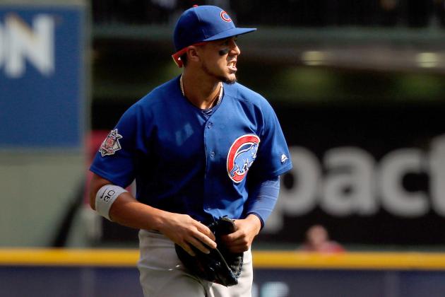 MILWAUKEE, WI - SEPTEMBER 24: Jon Jay #30 of the Chicago Cubs reacts after making a diving catch for an out against the Milwaukee Brewers to end the fourth inning at Miller Park on September 24, 2017 in Milwaukee, Wisconsin.  (Photo by Jon Durr/Getty Images)