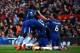 MANCHESTER, ENGLAND - FEBRUARY 25: Willian of Chelsea celebrates after scoring his sides first goal with team mates during the Premier League match between Manchester United and Chelsea at Old Trafford on February 25, 2018 in Manchester, England. (Photo by Clive Brunskill/Getty Images)