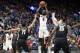 Georgia's William Jackson II (0) shoots ofter Vanderbilt's Jeff Roberson (11) during the second half in an NCAA college basketball game at the Southeastern Conference tournament Wednesday, March 7, 2018, in St. Louis. Georgia won 78-62. (AP Photo/Jeff Roberson)