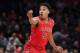 St. John's guard Justin Simon (5) reacts toward a referee during the first half of an NCAA college basketball game against Georgetown in the first round of the Big East conference tournament, Wednesday, March 7, 2018, in New York.