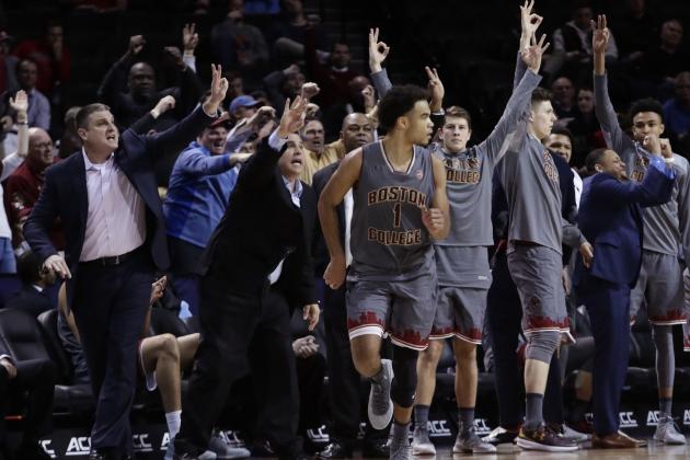 Boston College's Jerome Robinson (1) runs up court as his teammates celebrate a 3-point basket by Robinson during the second half of an NCAA college basketball game against North Carolina Statein the second round of the Atlantic Coast Conference tournament Wednesday, March 7, 2018, in New York. Boston College won 91-87. (AP Photo/Frank Franklin II)