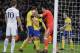 Juventus goalkeeper Gianluigi Buffon congratulates his teammate Giorgio Chiellini during the Champions League, round of 16, second-leg soccer match between Juventus and Tottenham Hotspur, at the Wembley Stadium in London, Wednesday, March 7, 2018. (AP Photo/Kirsty Wigglesworth)