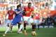 Chelsea's Danny Drinkwater, left, challenges for the ball with Manchester United's Anthony Martial during the English Premier League soccer match between Manchester United and Chelsea at the Old Trafford stadium in Manchester, England, Sunday, Feb. 25, 2018. (AP Photo/Rui Vieira)