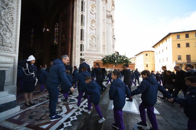 The coffin of Fiorentina's captain Davide Astori is carried inside Santa Croce basilica for the funeral on March 8, 2018 in Florence. Italian player Davide Astori likely died from a cardiac arrest linked to the slowing of his heart rate following the initial results of his autopsy. 
 Fiorentina and Astori's former club Cagliari announced they will retire his number 13 shirt in honour of the 31-year-old Italy international, who was found dead in his hotel room on Sunday ahead of a Serie A match at Udinese. / AFP PHOTO / Filippo MONTEFORTE        (Photo credit should read FILIPPO MONTEFORTE/AFP/Getty Images)