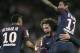 PSG's Adrien Rabiot, center, PSG's Angel Di Maria smile to PSG's Neymar, left, after scoring during the French League One soccer match between PSG and Toulouse at the Parc des Princes stadium in Paris, France, Sunday, Aug. 20, 2017. (AP Photo/Kamil Zihnioglu)