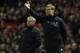 Manchester United's Portuguese manager Jose Mourinho (L) looks on as Liverpool's German manager Jurgen Klopp shouts instructions to his players from the touchline during the English Premier League football match between Manchester United and Liverpool at Old Trafford in Manchester, north west England, on January 15, 2017. / AFP / Oli SCARFF / RESTRICTED TO EDITORIAL USE. No use with unauthorized audio, video, data, fixture lists, club/league logos or 'live' services. Online in-match use limited to 75 images, no video emulation. No use in betting, games or single club/league/player publications. / (Photo credit should read OLI SCARFF/AFP/Getty Images)