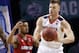 Virginia's Jack Salt (33) passes away from Louisville's Quentin Snider (4) during the first half of an NCAA college basketball game in the quarterfinal round of the Atlantic Coast Conference tournament Thursday, March 8, 2018, in New York. (AP Photo/Frank Franklin II)