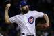 FILE - In this Wednesday, Oct. 18, 201,7 file photo, Chicago Cubs starting pitcher Jake Arrieta throws during the first inning of Game 4 of baseball's National League Championship Series against the Los Angeles Dodgers in Chicago. Cubs pitchers Arrieta and Wade Davis were among nine free agents who turned down $17.4 million qualifying offers from their teams Thursday, Nov. 16, 2017. (AP Photo/Nam Y. Huh, File)