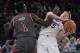 St. John's guard Bashir Ahmed (1) guards Xavier guard J.P. Macura (55) during the first half of an NCAA college basketball game in the quarterfinals of the Big East conference tournament, Thursday, March 8, 2018, at Madison Square Garden in New York. (AP Photo/Mary Altaffer)