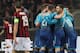 MILAN, ITALY - MARCH 08: Henrikh Mkhitaryan of Arsenal celebrates with his team-mates after scoring the opening goal during UEFA Europa League Round of 16 match between AC Milan and Arsenal at the San Siro on March 8, 2018 in Milan, Italy. (Photo by Marco Luzzani/Getty Images)